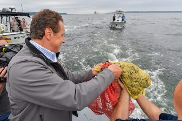 Governor Andrew Cuomo announced a $10.4 million plan to improve water quality on Long Island that will create a shellfish sanctuary in Shinnecock Bay. COURTESY OF ANDREW CUOMO'S PRESS OFFICE
