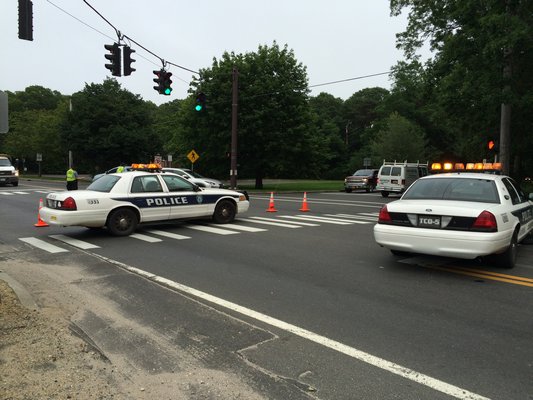 Police rerouted traffic after a box truck struck a pole in Montauk Highway in Wainscott last week. LAURA WEIR