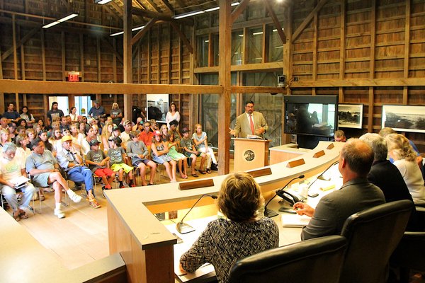 Trevor Darrell speaks at a Town Board meeting to address surf schools at Ditch Plains Beach. KYRIL BROMLEY