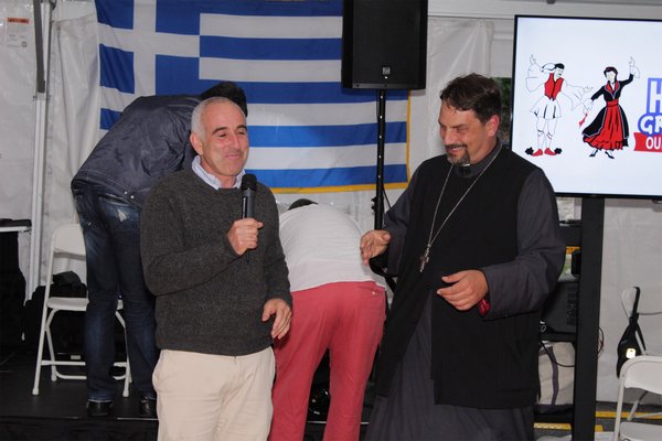 Southampton Town Supervisor Jay Schneiderman with Father Constantine Lazarakis.