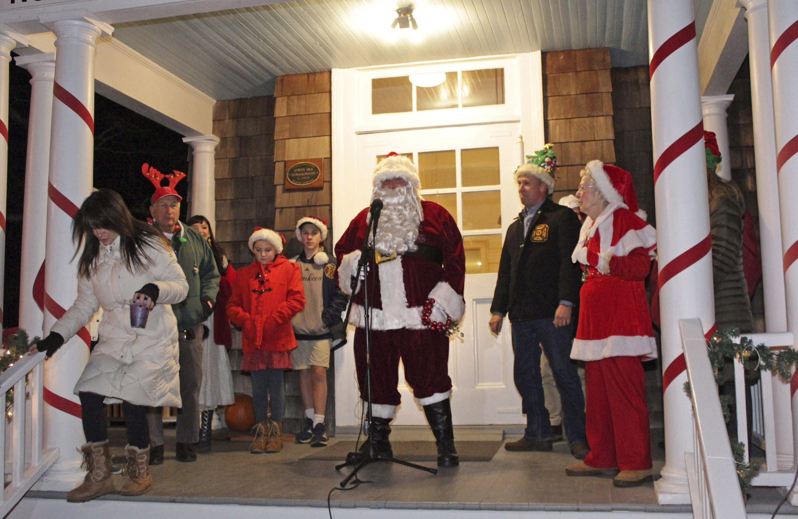Santa arrives at the North Sea Community Association's annual tree lighting on Saturday.