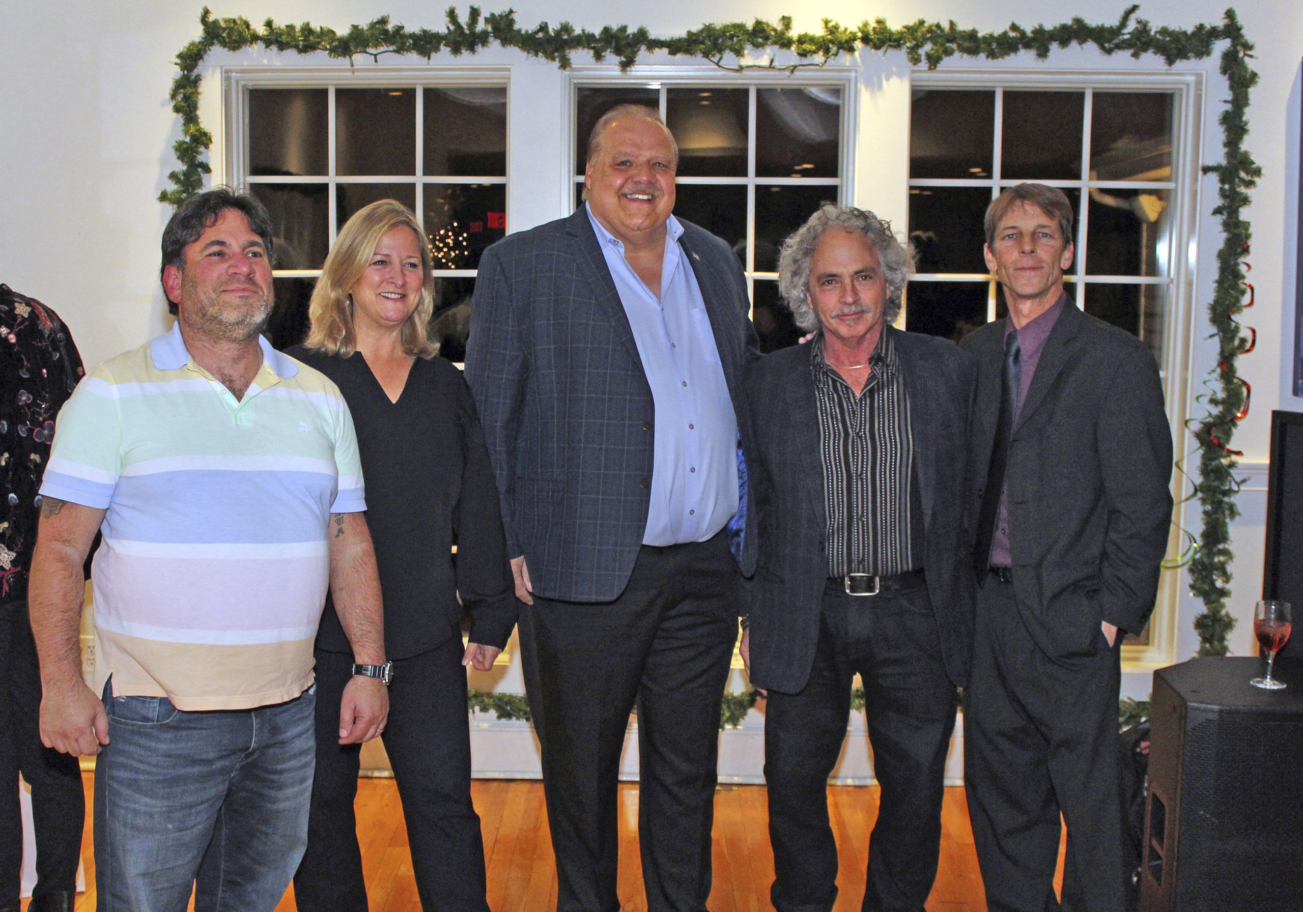 David Agtsteribbe, Maria Moore, Rick Martel, Russel Blue and David O'Shea at the Maureen's Haven Homeless Outreach winter benefit on Saturday night at Seasons of Southampton.  TOM KOCHIE