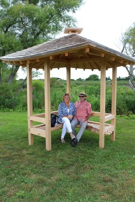 Tish Rehill and Michael Doherty in a pavilion created by Thomas Matthews.