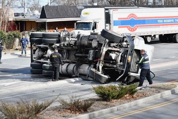 A cement truck rolled over in front of Cromer's Market in Noyac. DANA SHAW