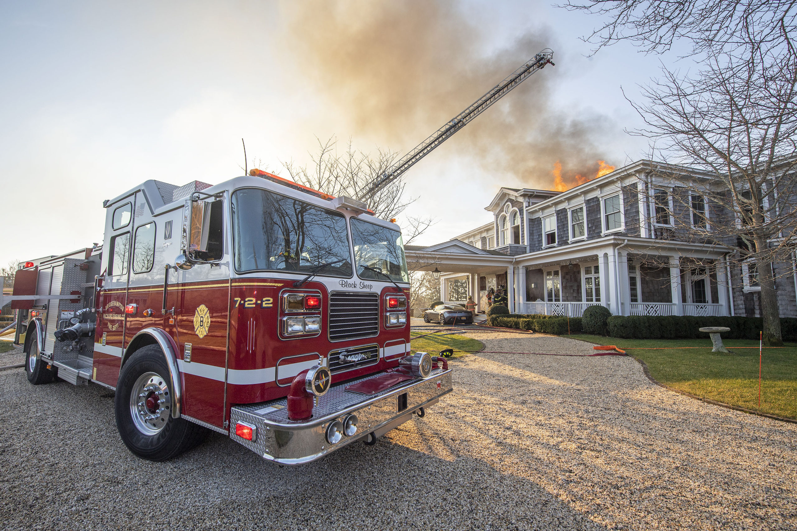 The Bridgehampton Fire Department, assisted by mutual aid from several other local fire departments, battled a   fire in the roof of a Water Mill mansion on Little Noyac Path in Water Mil on Saturday.