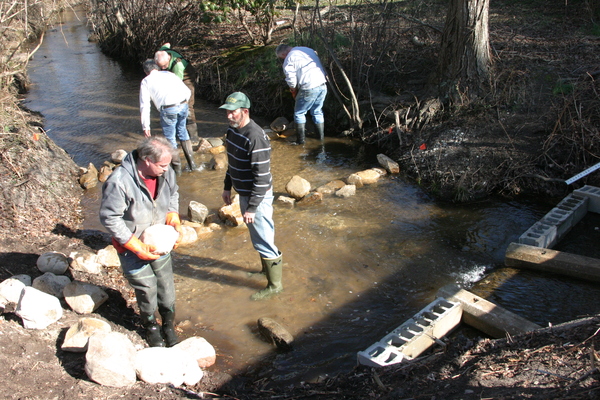  the water flowing out of the culvert under North Sea Road is too shallow for alewives to swim up on their way from Peconic Bay to Big Fresh Pond. DANA SHAW
