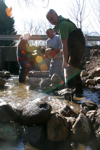 By placing two rows of rocks at the foot of the culvert