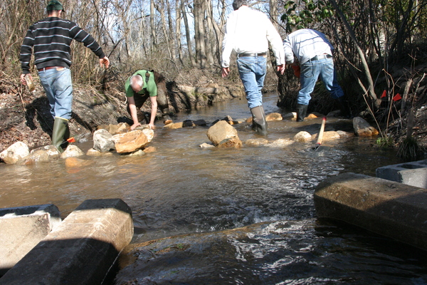 The rocks slow the flow of water