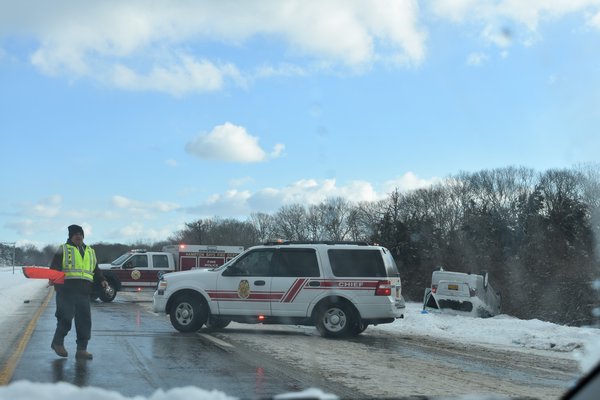 A vehicle driving eastbound on Sunrise Highway in Hampton Bays Friday morning left the roadway and overturned just past Exit 65N.