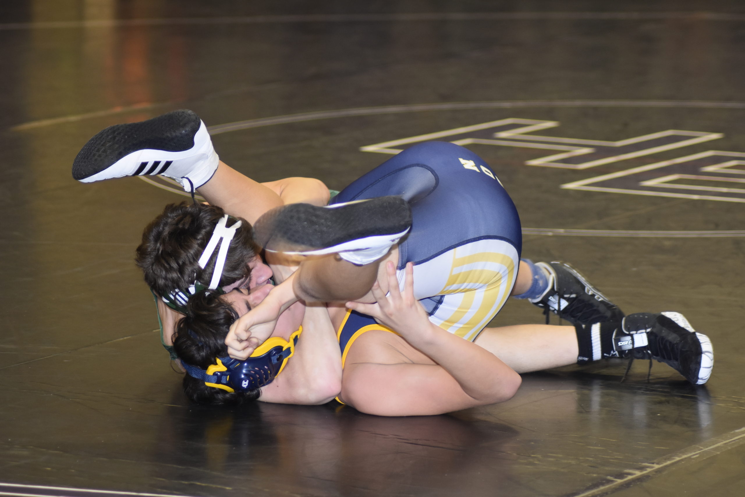 Sal Francapane of Westhampton Beach cradles his West Babylon opponent at the Doc Fallot Memorial Duals at Hampton Bays on Saturday.
