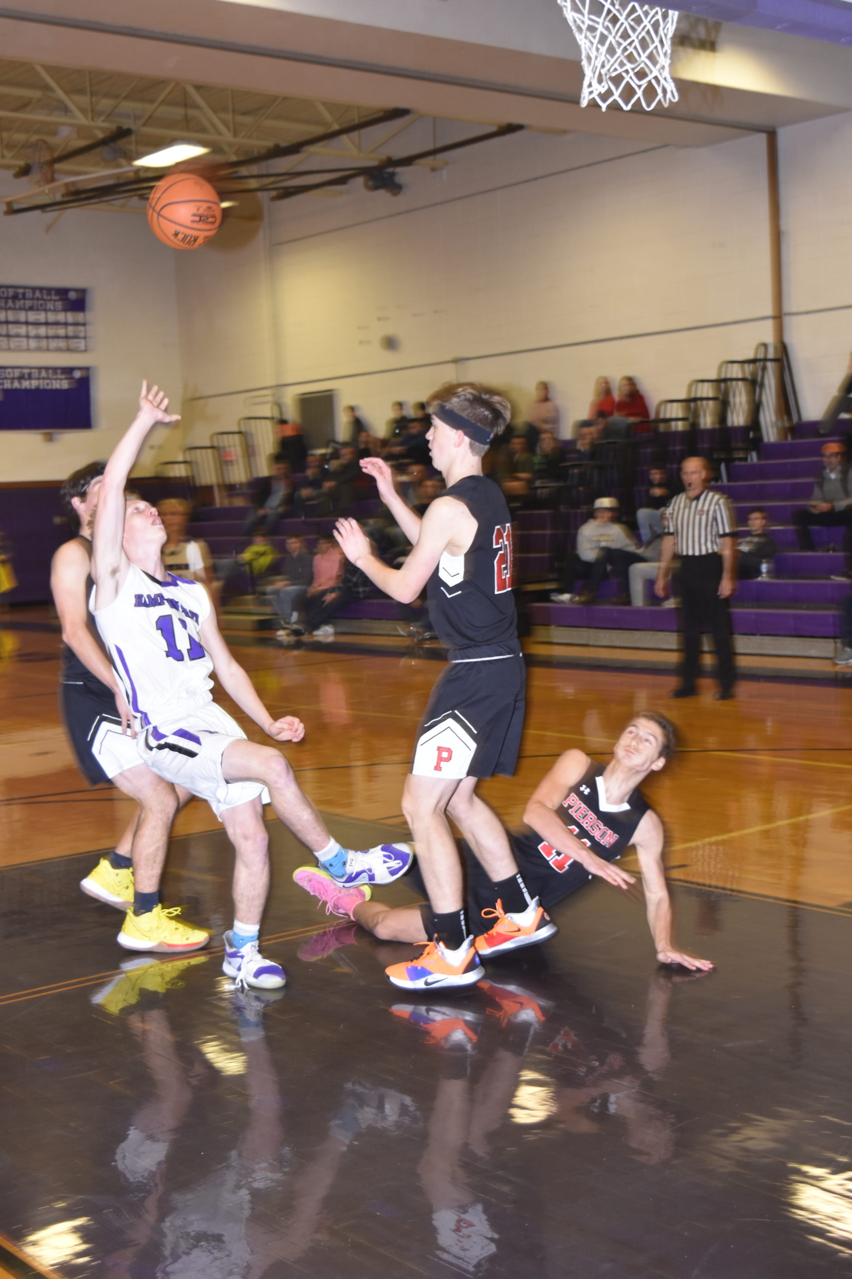 Senior Bayman Lucas Brown throws up a shot while getting fouled.