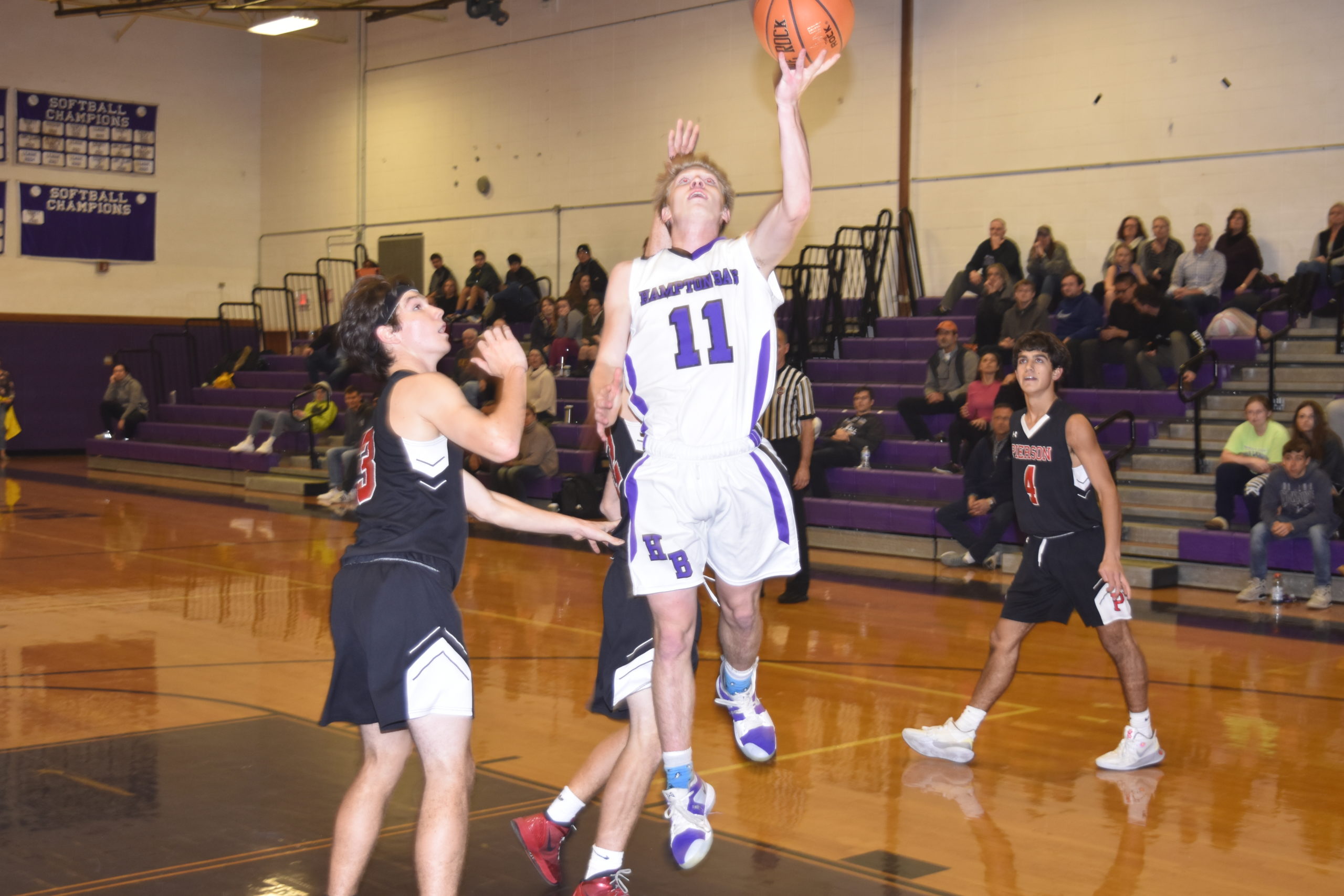 Hampton Bays senior Lucas Brown finds an opening in the Pierson defense and scores.