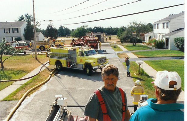 Firefighters battle the 1995 Sunrise Wildfires in Westhampton. COURTESY FRED BAUER