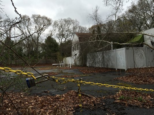 The site of a proposed car wash in Wainscott has been blighted for nearly 10 years following the demise of a nightclub that once operated there. LAURA WEIR