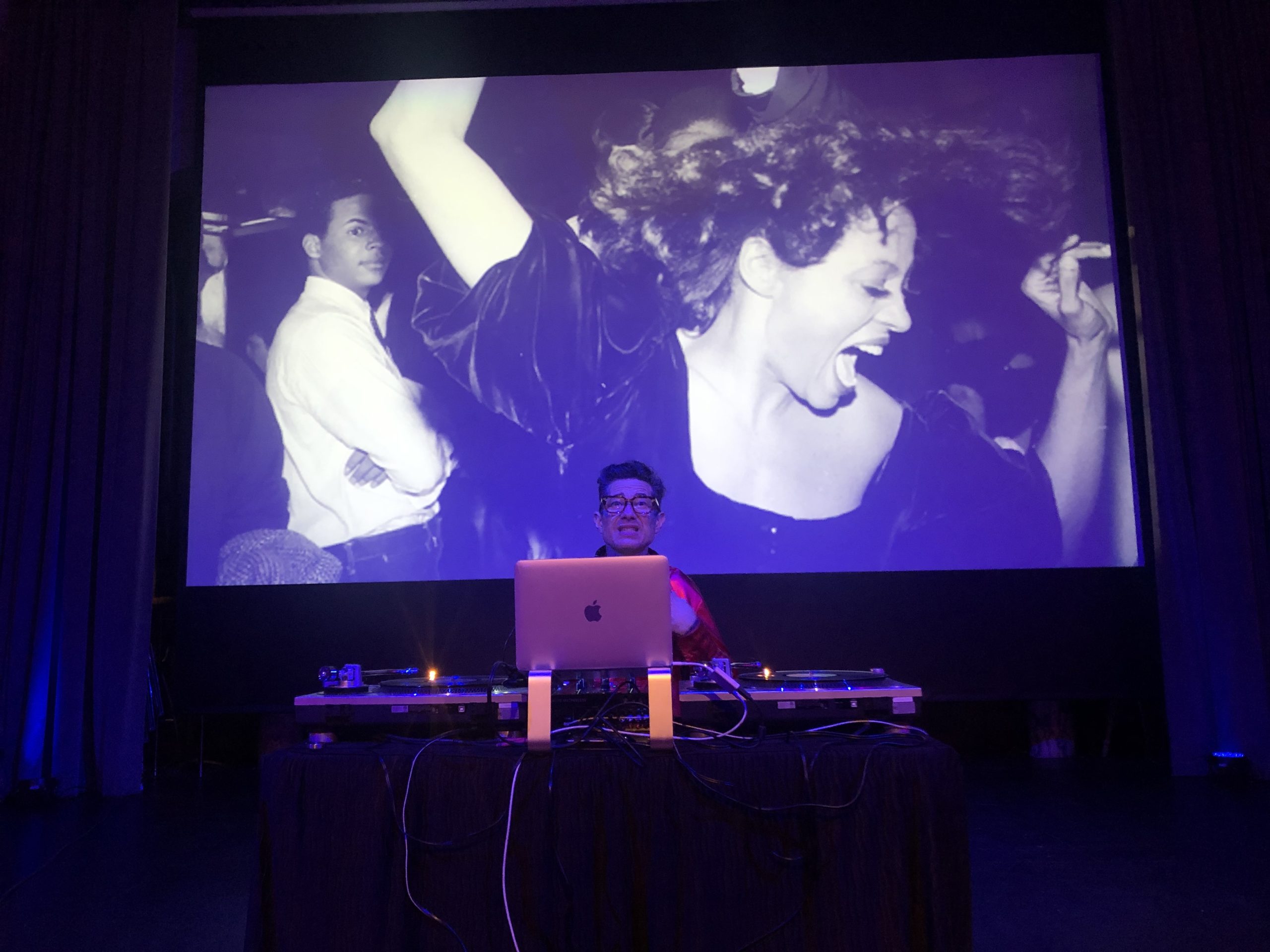 Carlos Lama spinning discs at Southampton Arts Center.