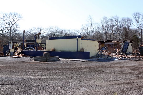 Workers demolished Casey's in Westhampton Beach on Wednesday. BY NEIL SALVAGGIO