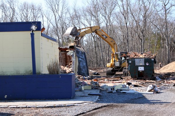 Workers demolished Casey's in Westhampton Beach on Wednesday. BY NEIL SALVAGGIO