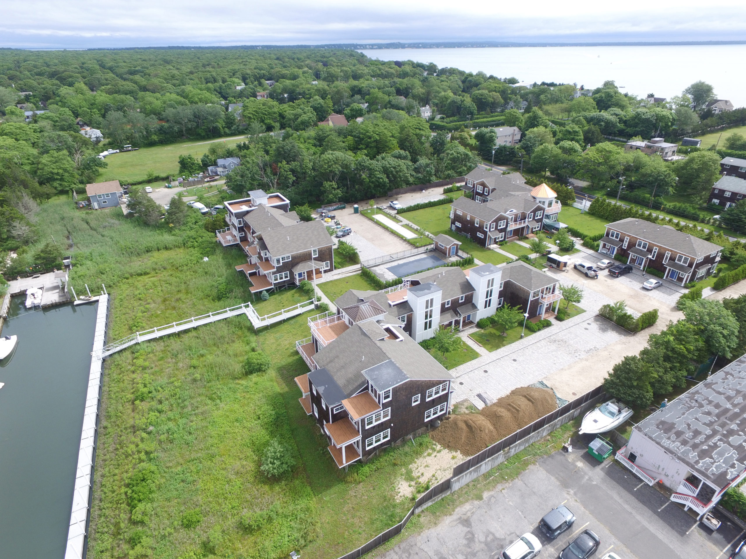August 30 -- A court has ordered the sale of Ponquogue Point, the bankrupt condominium project on Foster Avenue in Hampton Bays that stalled when it was near completion. Ponquogue Point has sat mostly idle for a few years as the project has been caught up in legal battles. But now, with the court-ordered bankruptcy sale, a new owner could soon step in to finish the development, and residents could start moving in shortly thereafter. Meridian InvestmentSales, a New York City real estate firm, is marketing Ponquogue Point after the court approved the firm in a July 23 order.