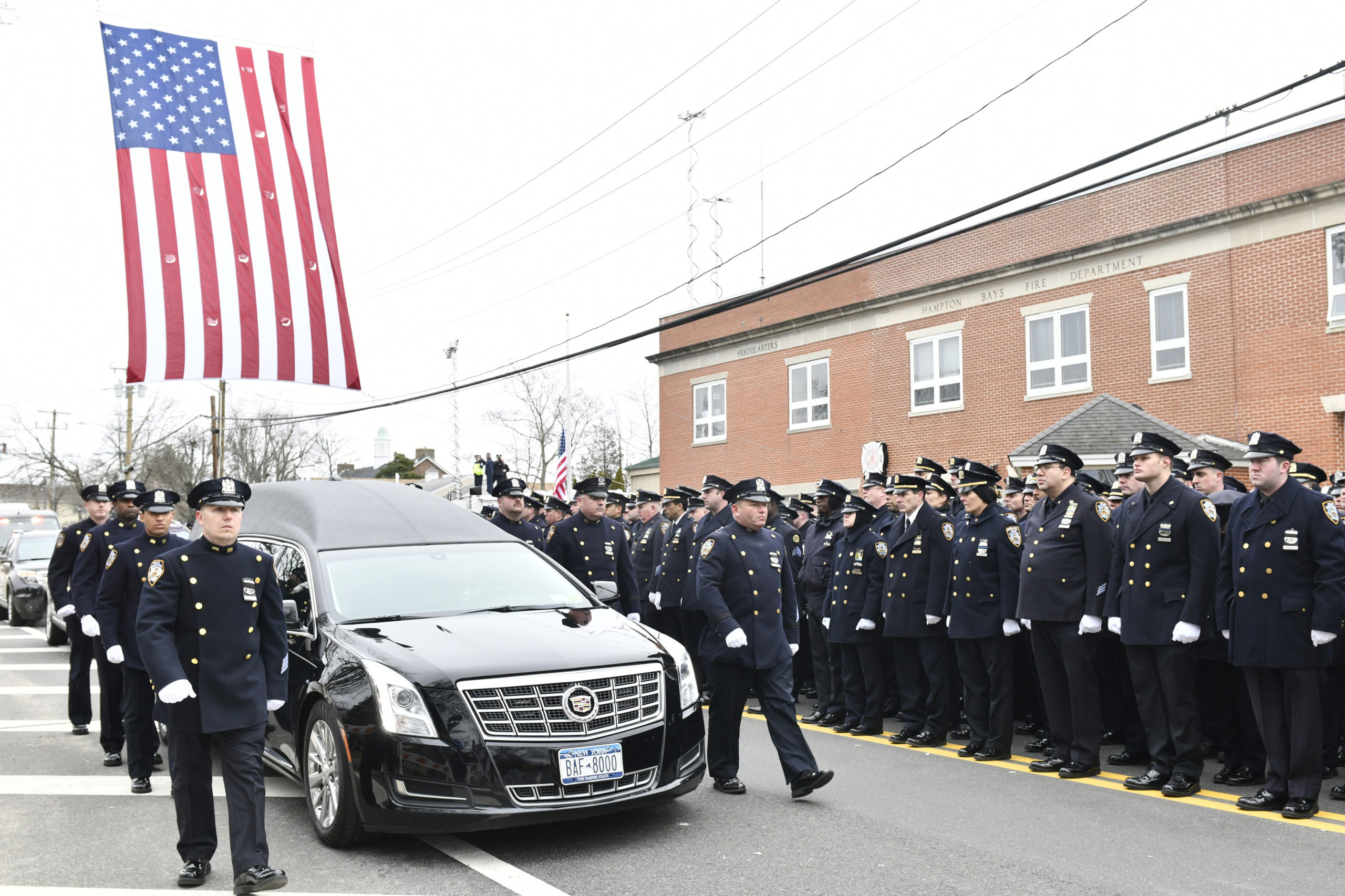 Paying Respect 
January 21 -- Hundreds of police officers from departments across the country turned out on Wednesday for the funeral of New York Police Department Detective Brian Simonsen, 42, a Calverton resident, at St. Rosalie’s Church in Hampton Bays. Det. Simonsen was killed on February 12 when he and six other officers responded to an armed robbery in Queens.