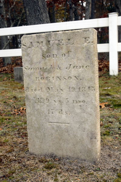Samuel E. Robinson's father's headstone in the Squires (Fournier) Burying Ground in Hampton Bays.  DANA SHAW