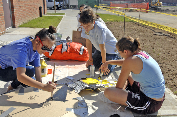 Cassidy Guida and Rienna Russo work on the junior class 