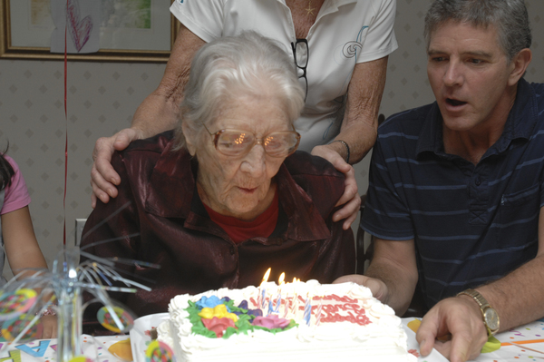 Mina Cory with her daughter Mina Kahofer and son Daniel at her 100th birthday party at the Hamptons Center for Rehab on Thursday