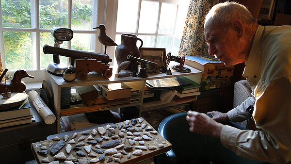 Richard Hendrickson proudly displays his arrowhead collection in his home office in Bridgehampton. COLLEEN REYNOLDS