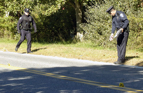 Police investigate the scene of a fatal accident on Mitchells Lane in Bridgehampton on Monday morning.