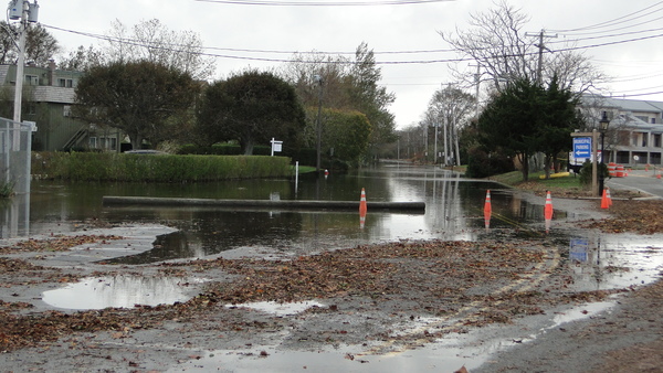 Long Island Avenue and Bridge Street in Sag Harbor were still heavily flooded from Hurricane Sandy on Tuesday afternoon. COLLEEN REYNOLDS
