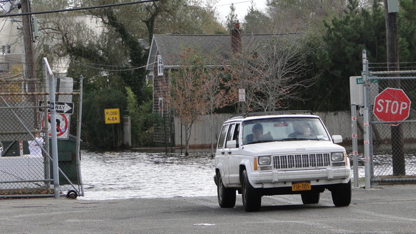 Meadow Street in Sag Harbor was still heavily flooded From Hurricane Sandy on Tuesday afternoon. COLLEEN REYNOLDS