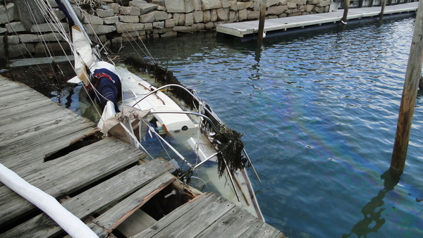A sloop sank in Sag Harbor during Hurricane Sandy. COLLEEN REYNOLDS