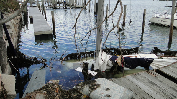 A sloop sank in Sag Harbor during Hurricane Sandy. COLLEEN REYNOLDS