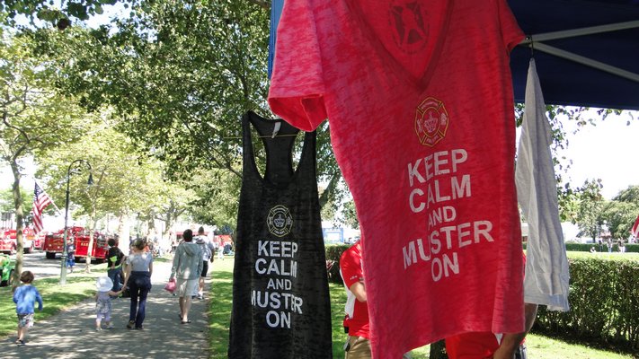 Shirts for sale at the 32nd annual Southampton Fire Department Antique Muster and Parade on Saturday in Southampton Village. COLLEEN REYNOLDS