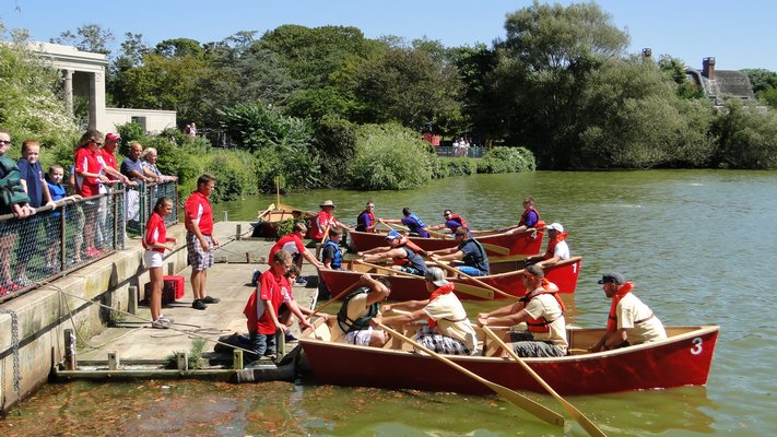 The start of a whaleboat race at the 32nd annual Southampton Fire Department Antique Muster and Parade on Saturday in Southampton Village. COLLEEN REYNOLDS