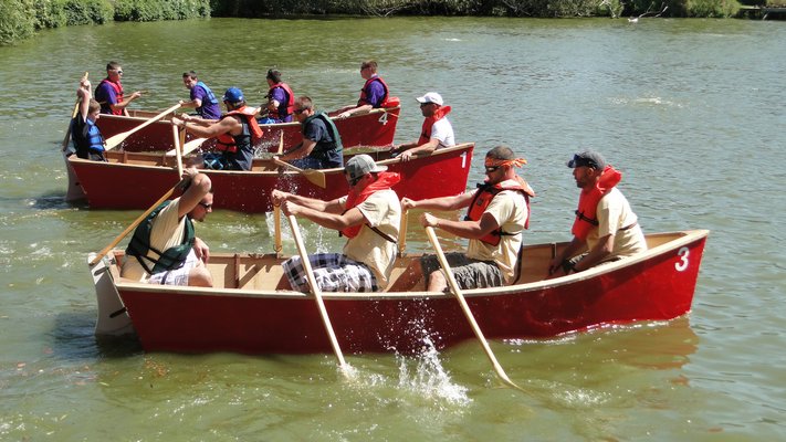 Whaleboat racing at the 32nd annual Southampton Fire Department Antique Muster and Parade on Saturday in Southampton Village. COLLEEN REYNOLDS