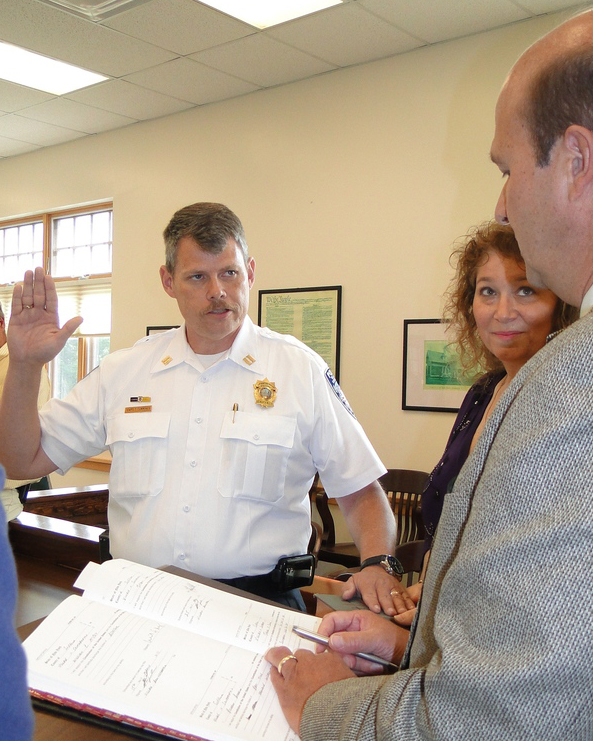 Newly promoted Southampton Village Police Chief Thomas Cummings receives congratulations Friday morning