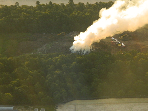 An aerial view of the brush fire at Speonk Earth Recycling on Saturday. COURTESY BEN HUBBARD