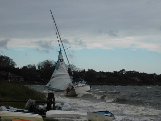 Two boats came loose from their moorings on Friday morning in Lake Montauk.  ELIZABETH VESPE
