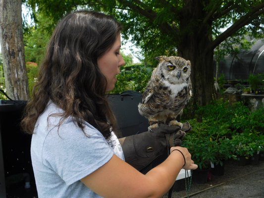  handled the birds and gave an educational talk about conservation. ELIZABETH VESPE