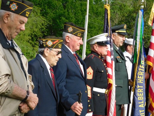 The American Legion Post 419 and the VFW Post 550 honored deceased veterans with memorial services at multiple East End cemeteries.   ELIZABETH VESPE