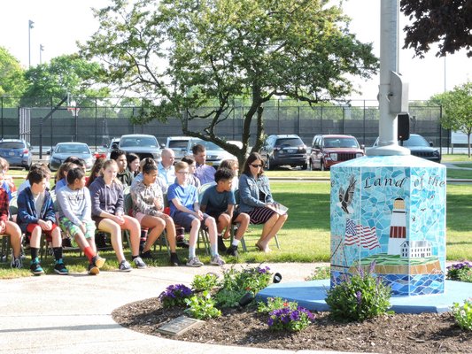  a ceremony was held at the Westhampton Beach Middle School to rededicate the school’s September 11th Memorial at its flagpole. ELSIE BOSKAMP