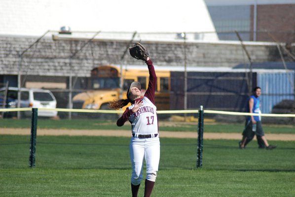 Senior Lady Mariner Jenna Hegel makes a catch in left field. By DREW BUDD