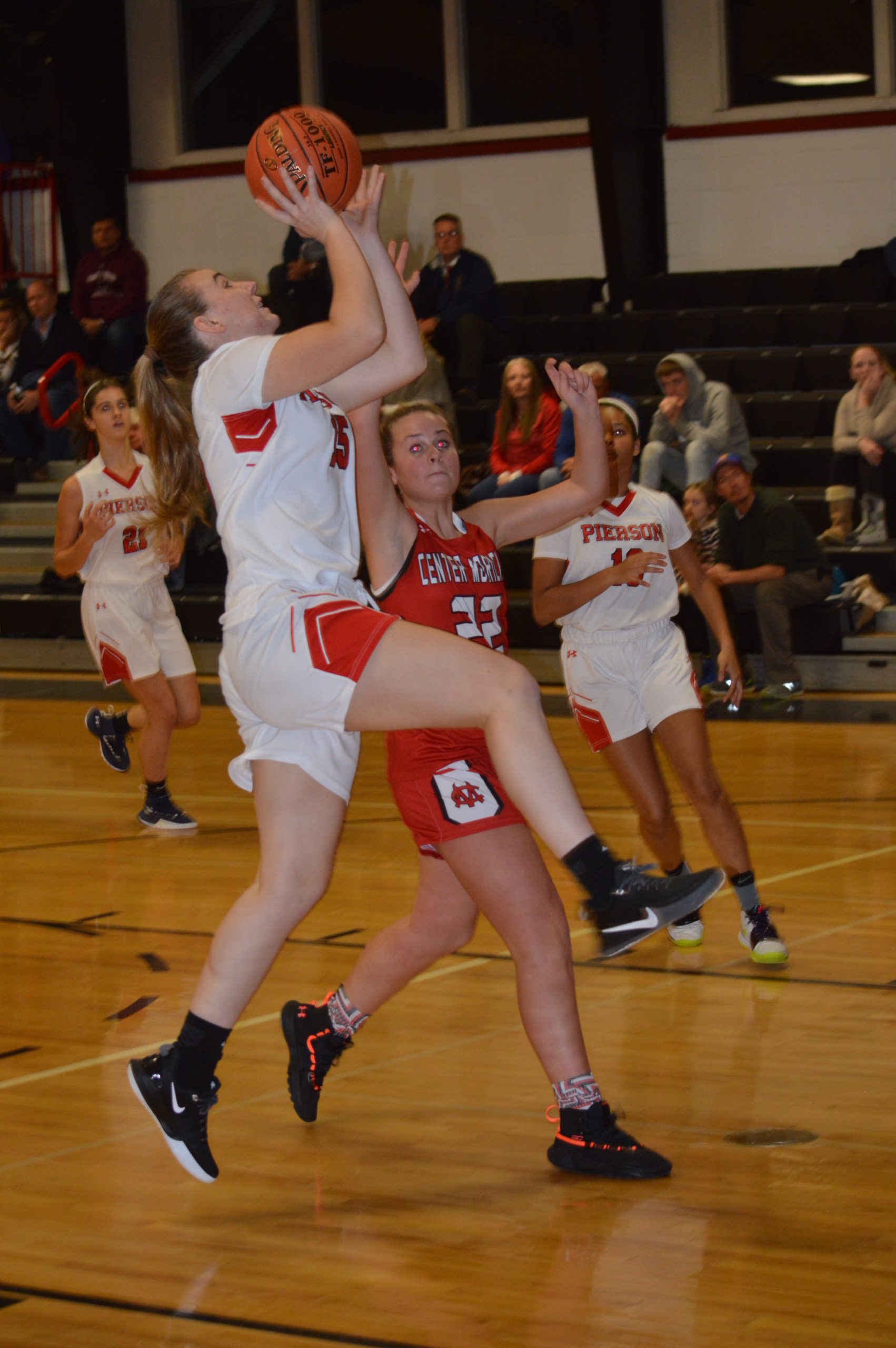 Kathryn Powell shooting against Center Moriches.