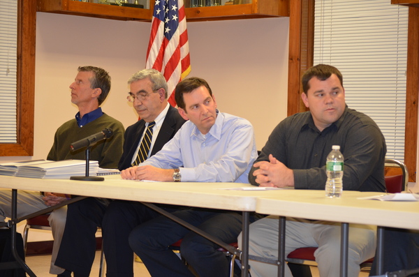 Representatives of T-Mobile and cell phone technology specialists sit on the panel at the November 4 meeting regarding a proposed cell phone tower at the East Quogue Firehouse. 