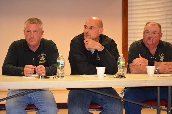 Members of the East Quogue Fire Department sit on the panel at the November 4 meeting regarding a proposed cell phone tower at the East Quogue Firehouse.