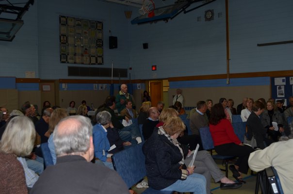 Fire Department Chief Greg Celi presents at the November 4 meeting regarding a proposed cell phone tower at the East Quogue Firehouse.