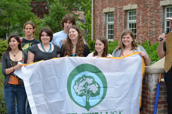 Students from the Classmates United in Restoring the Environment-CURE- club from Westhampton Beach High School at the Arbor Day ceremony on Thursday. ERIN MCKINLEY