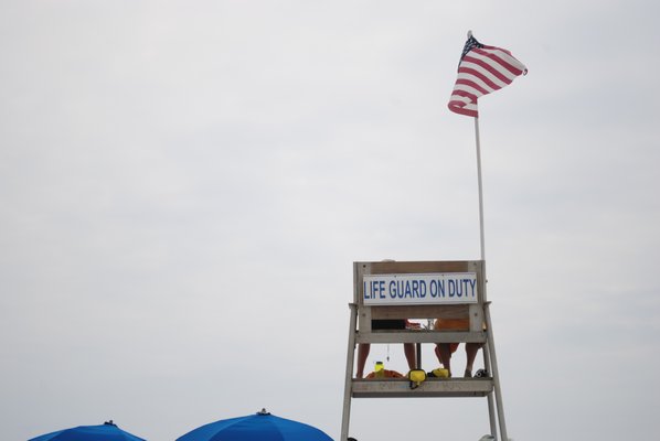 The lifeguards on duty are watching out for rip currents at Rogers Beach. AMANDA BERNOCCO