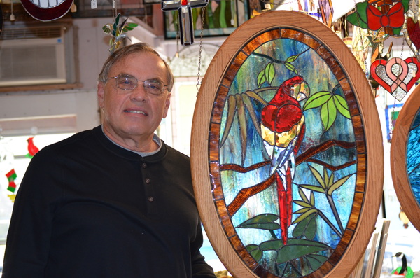 George Dalecki with one of his most memorable stained glass pieces