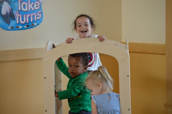 Kids at the Wuneechanunk preschool play on the slide. ALISHA STEINDECKER